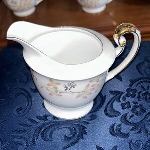 Porcelain Creamer Pitcher with Gold Trim and Floral Motif